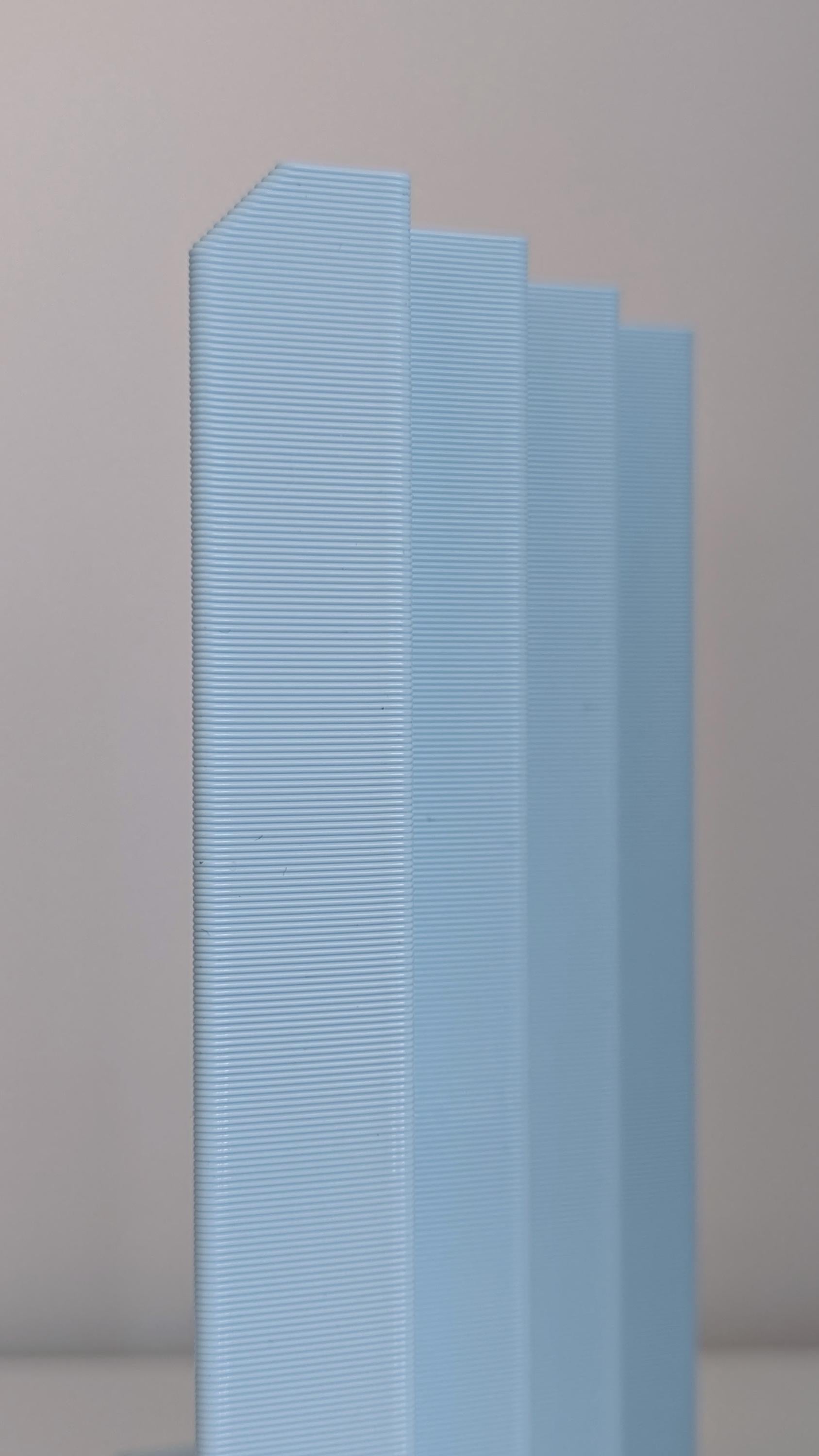 RAW BOOK STOP – Minimalist 3D Printed Bookend by Martin Žampach