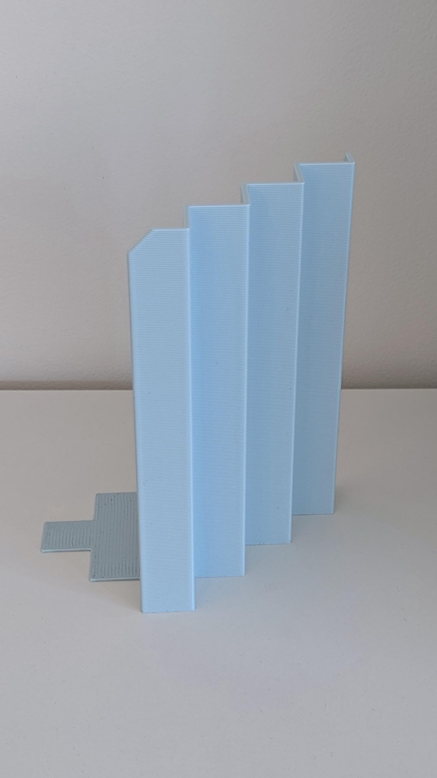 RAW BOOK STOP – Minimalist 3D Printed Bookend by Martin Žampach